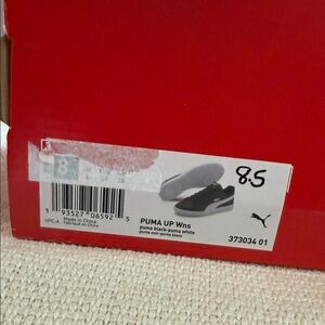 Puma Women's Black and White Sneakers